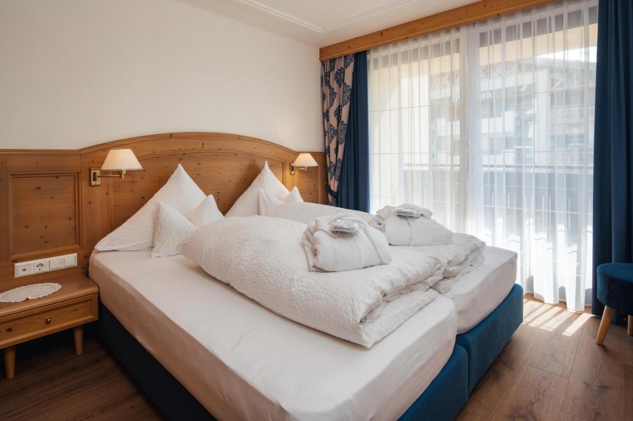 Hotel Garni Alpenruh-micheluzzi 4*